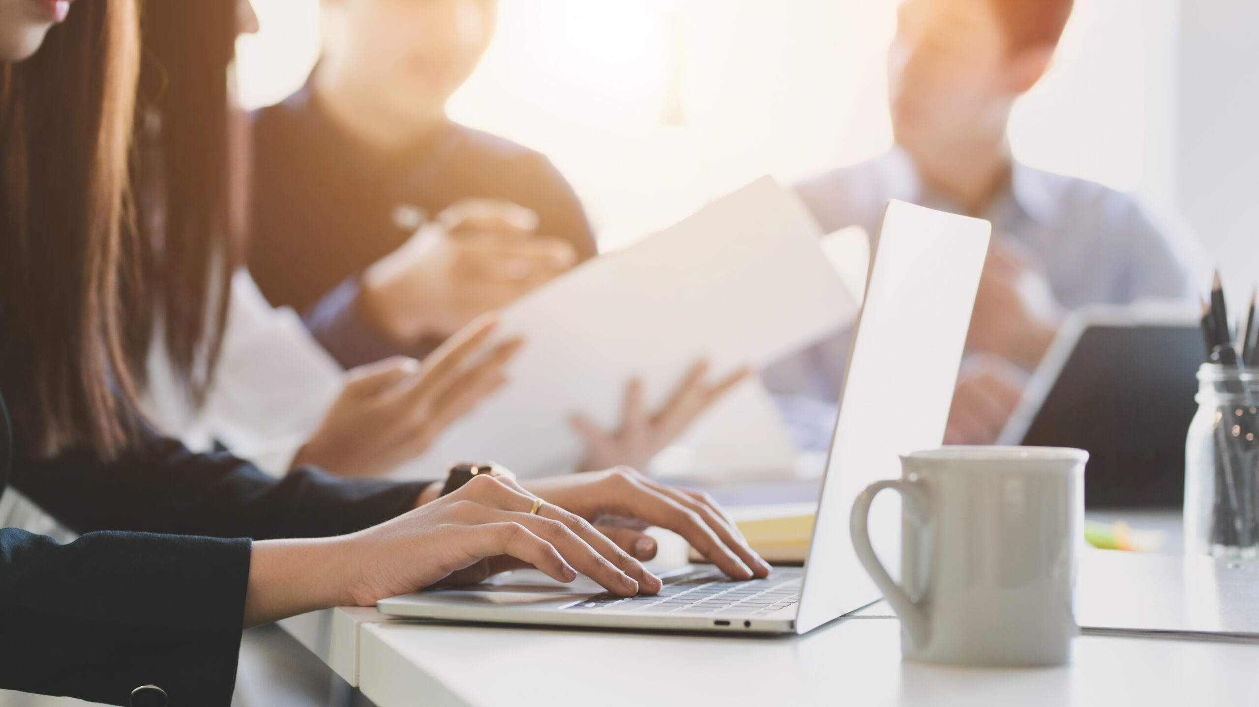 Close up view of business people typing on computer laptop while working with her team Dashboard Screenshot